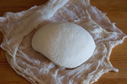 Homemade paneer cheese, unwrapped from the butter muslin. 