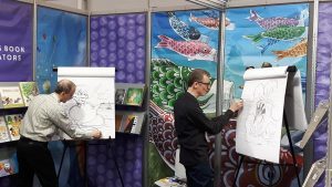 2 illustrators at the 2018 Bologna Children's Book Fair go head to head in illustrations a new manuscript.