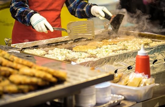Seoul chef cooking food for sale at night market