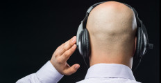 bald-headed-man-with-headphone-picture-id618944450-2