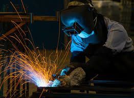 man welding