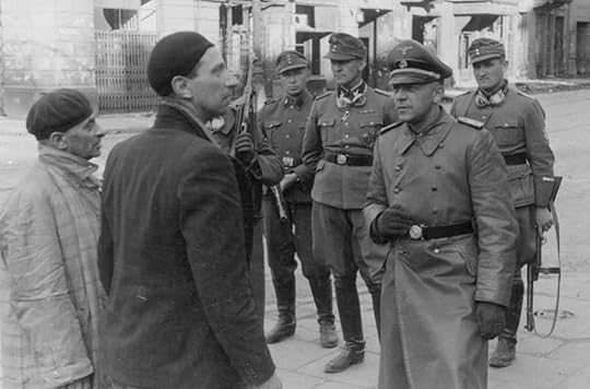 German officer questioning Jews in Warsaw, Poland, 14-15 May 1943 (US National Archives)