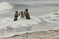 120px-A_family_enjoys_a_dip_in_the_ocean