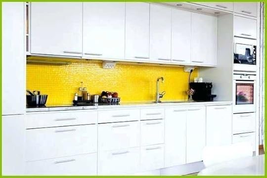 yellow backsplash tile white kitchen cabinets with beautiful and gray