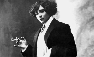 Colette in men's clothes