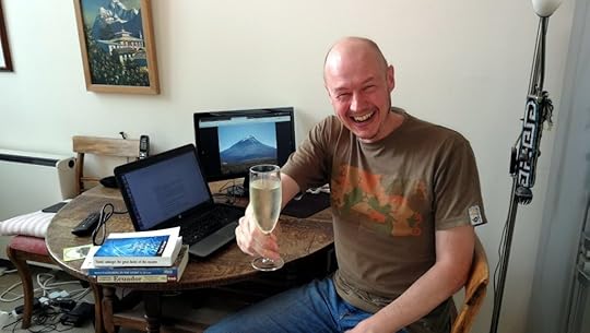 Cheers! A wee glass of prosecco to celebrate finishing the first draft. I look quite pleased.