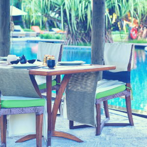 One of the best places to write is relaxing poolside on a warm day.