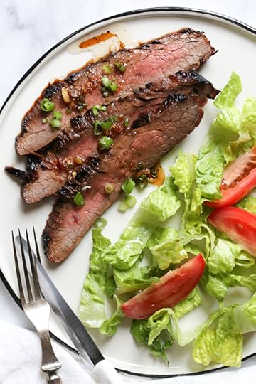 The marinade in this Grilled Asian-style Soy Marinated Flank Steak takes an uninteresting piece of steak and turns it into a mouthwatering dish!