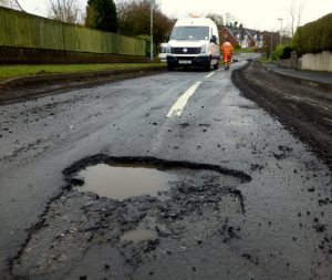 pothole in the road - FixMyStreet website tool and app