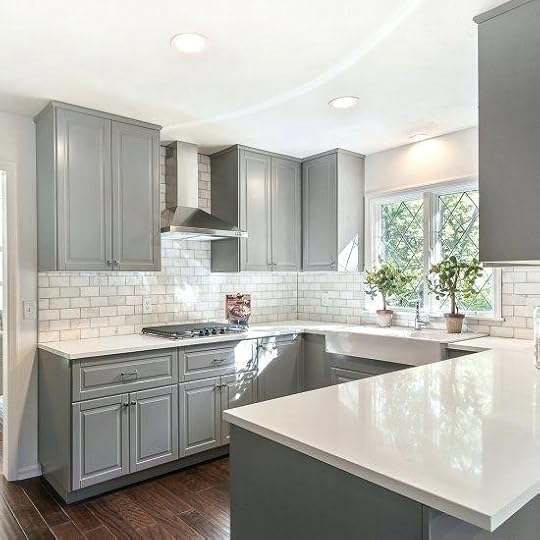 white cabinets with countertops gray shaker quartz counter tops marble subway tile and a countertop grey backsplash