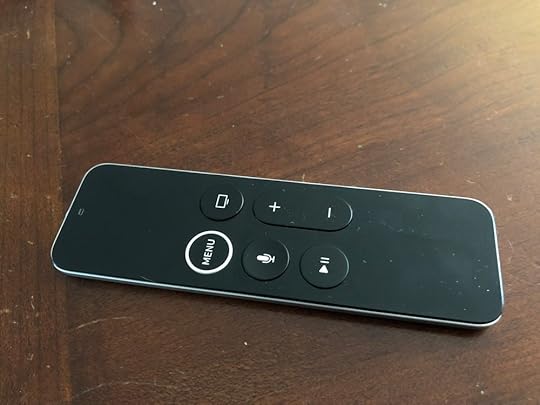  I don't know how many times I've picked this up upside-down. The top half above the menu is the swipe surface/clicker. The bottom half is for holding. 