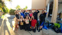 The author’s SharkSchool class gearing up for their next dive with bull sharks at ProDive International (Photo credit: Lisa Niver, We Said Go Travel)