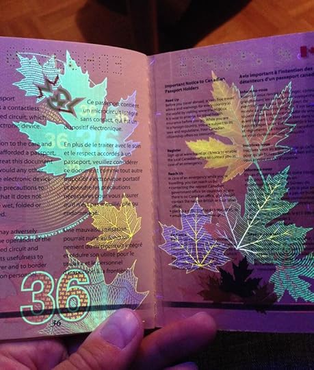 Canadian passport with UV light