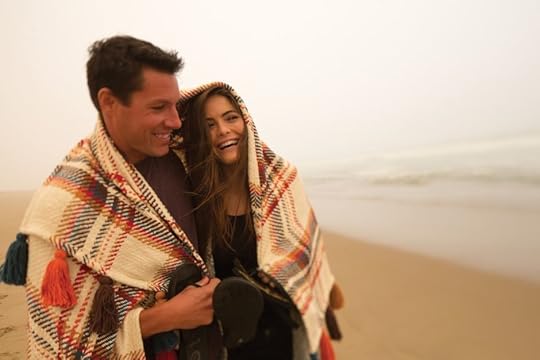 Couple walking on the bach Santa Maria Valley