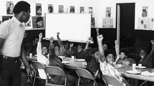 A teacher and his at a Black Panther liberation school. (Credit: Bettmann Archive/Getty Images)