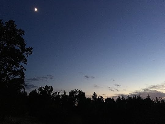 Dark night sky whisper of light blink of moon