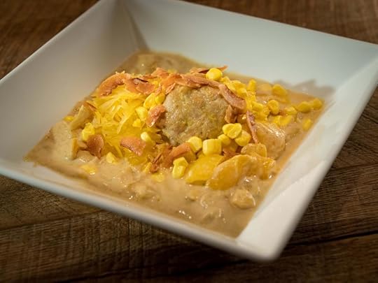 Chicken curry with spaghetti squash, pickled corn, and coconut chips 