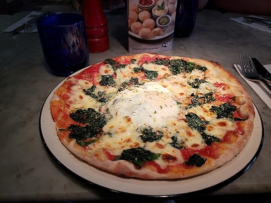 Image may contain: pizza and food