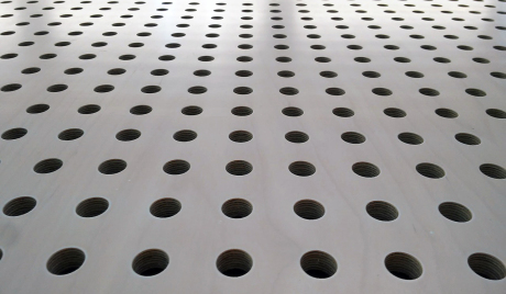 round holes on smooth metal surface