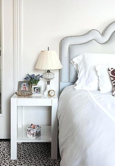 parson end table chic bedroom features a light blue headboard with silver trim on bed dressed in white scalloped bedding next to west elm parsons atop walmart