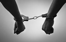 couple handcuffed together