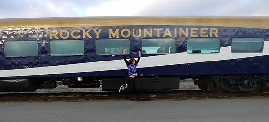 Lisa Jumping for JOY rocky Mountaineer