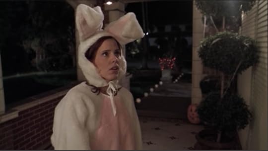 Anya is wearing an Easter bunny-style suit, but the ears/head is a hood that allows her face to be shown.