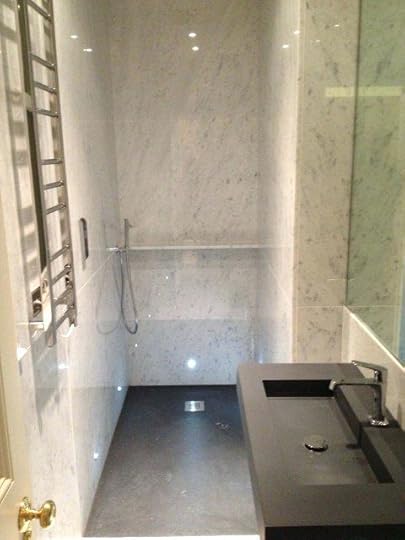 carrara marble shower walls white shelf
