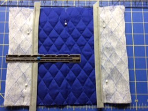 fold ends of quilted material