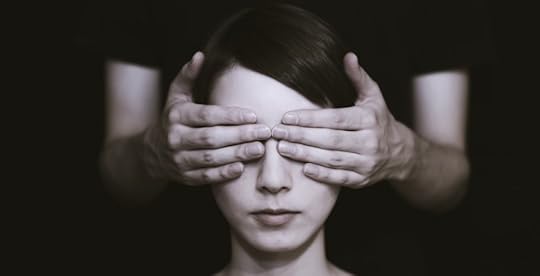 Woman with hands over eyes representing blind spot