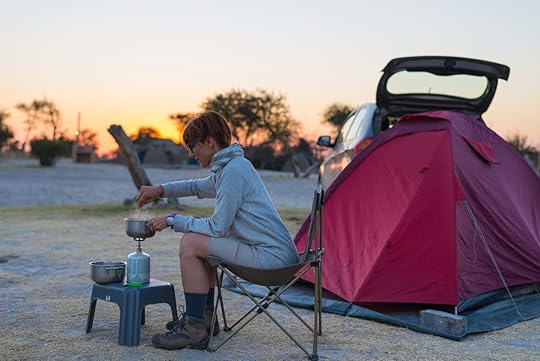 Woman with camping tent