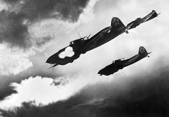 Soviet Il-2 aircraft attacking a German motorized column near Kursk, Russia, Jul 1943 (Russian International News Agency #225)