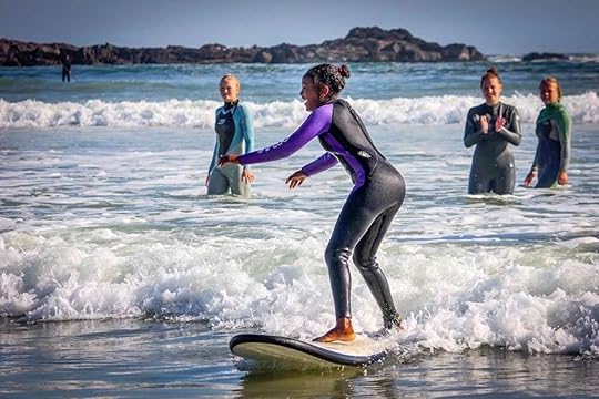 girl surfing with GVI International