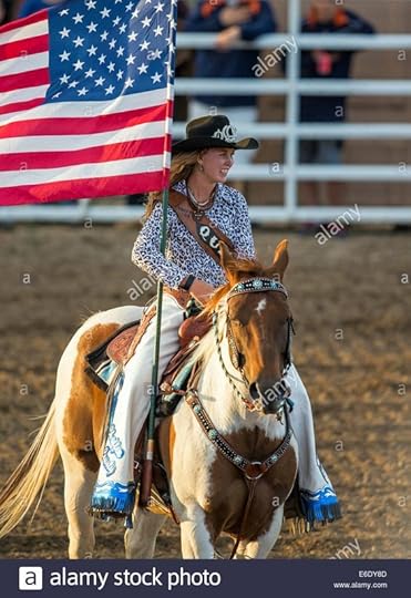 carrying the flag in a rodeo