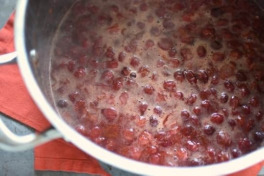 Cooked sour cherry apricot jam in the pot
