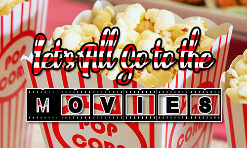 Popcorn in paper boxes with Let'all go to the movies over the top.