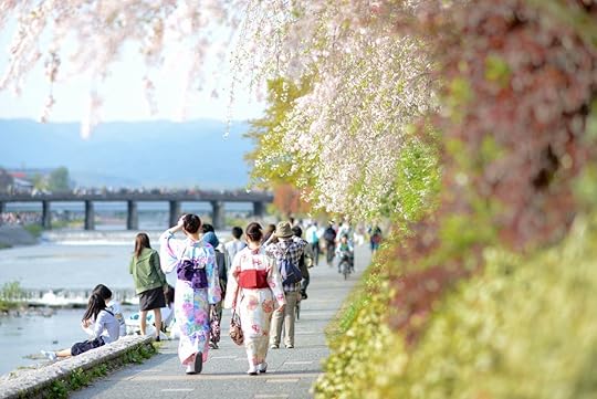 Kyoto bike-friendly waterways and women in traditional dress