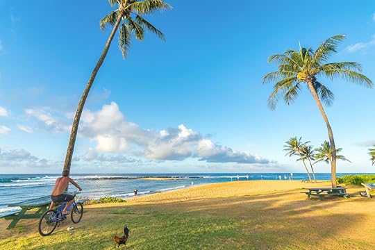 Kauai beach with cyclist