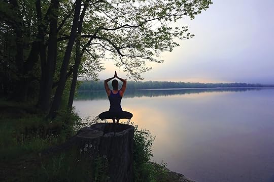 Woman at Kripalu doing yoga outside