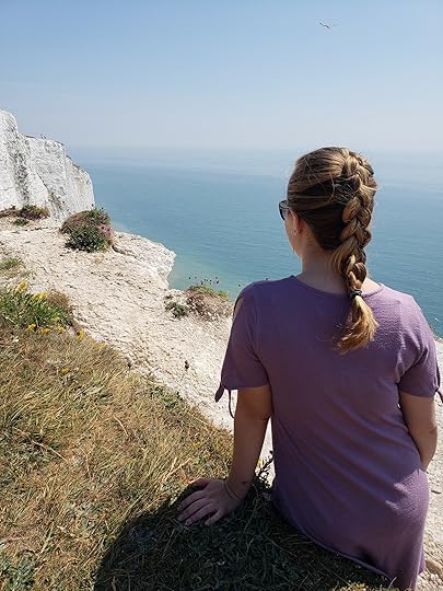 Image may contain: one or more people, people standing, sky, ocean, outdoor, nature and water