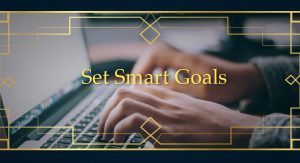 a man setting smart goals at his computer