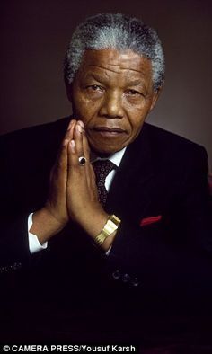 A descendant of kings who became the most famous black man in history: Life and legacy of Nelson Mandela, the secular saint who refused to give in to hate. Pictured at his South African home in 2010, 'triumphed as a symbol of national reconciliation between South Africa's races'
