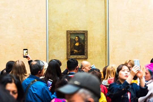Visitors crowding around the Mona Lisa
