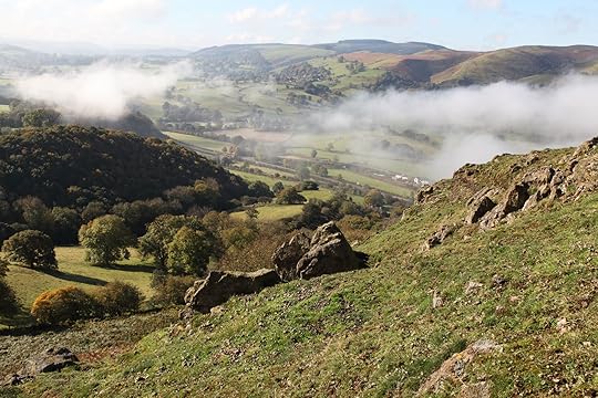 Outcrops on Ragleth Hill and view towards The Long Mynd