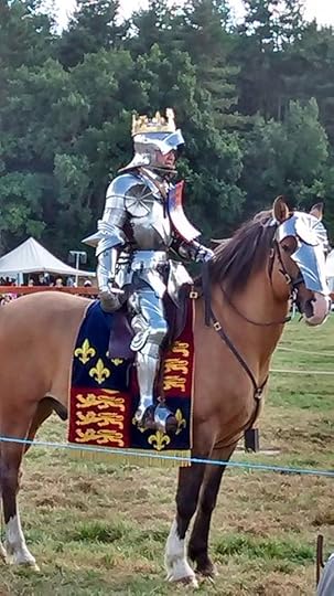 Image may contain: one or more people, people riding horses, horse and outdoor