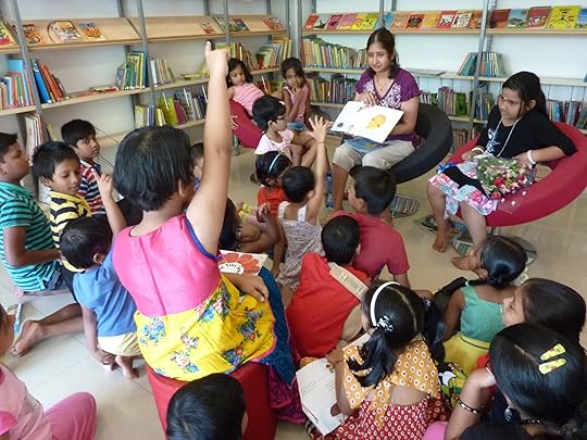 Reading stories from Balu's Basket and Where is Gola's Home?