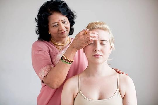Woman getting her head massaged, Pratima in New York