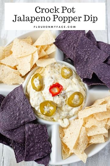 Crock Pot Jalapeno Popper Dip recipe served with white and purple tortilla chips