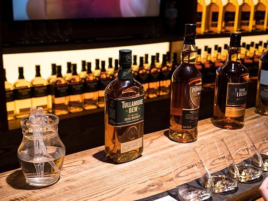 Whiskey bottles lined up at the Dublin Whiskey Museum