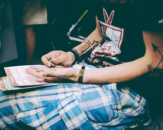 Man counting change money